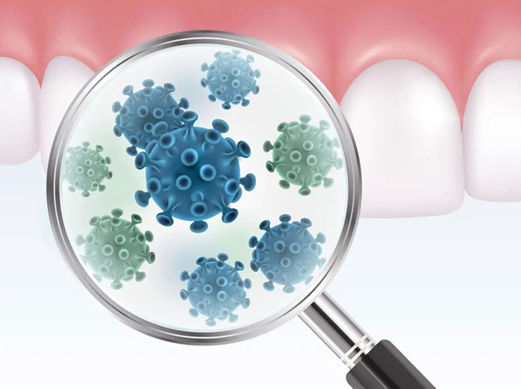 Magnifying glass revealing colorful bacteria and microorganisms in dental plaque or oral cavity samples.